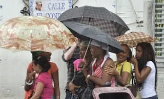 Onda tropical y vaguada provocarán aguaceros esta tarde 5