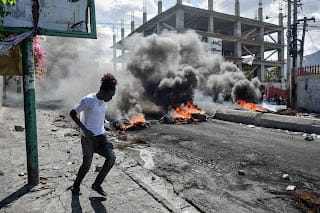 Al menos un muerto durante las protestas violentas en numerosas ciudades de Haití 21 Al menos un muerto durante las protestas violentas en numerosas ciudades de Haití