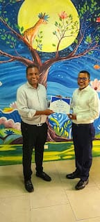 La UASD Recinto Santiago reconoce a los artistas Wilkins Terrero y Pedro Javier Cofresí por su destacada colaboración en la Estancia Infantil