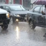 Nubes y lluvias en República Dominicana debido a la influencia de una vaguada y un sistema de baja presión en el Caribe.